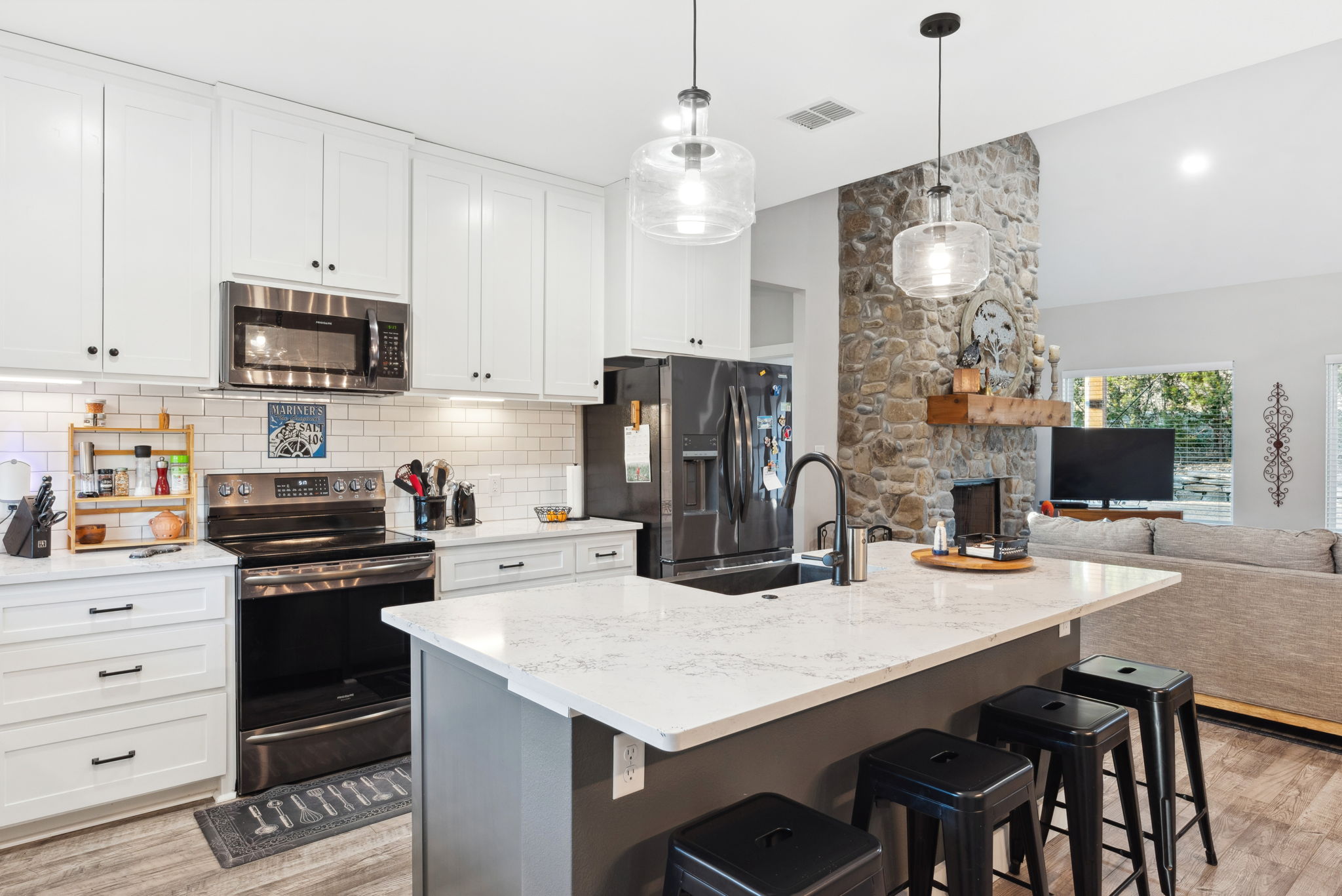 Kitchen with an Island and stools